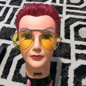 Yellow colored sunglasses from Rue 21